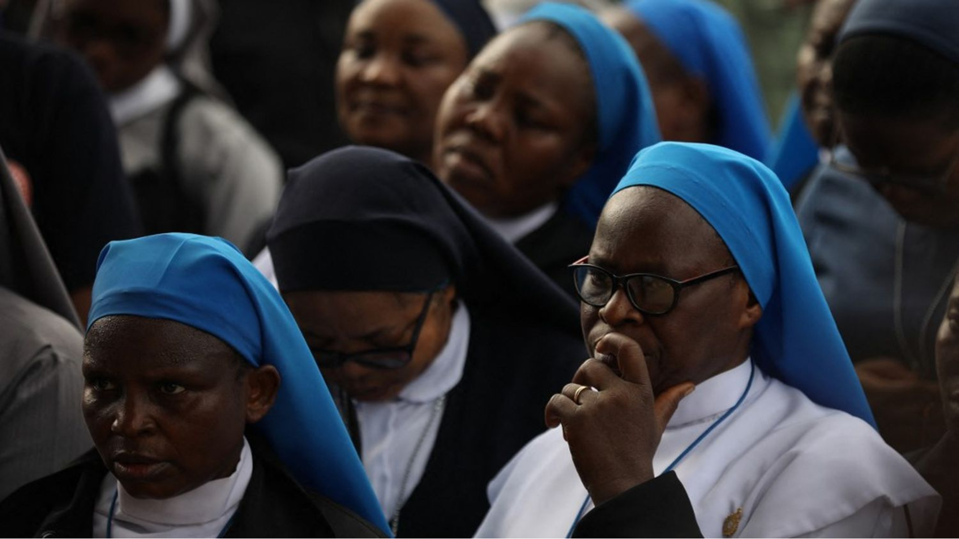 Group of nigerian catholic nuns praying