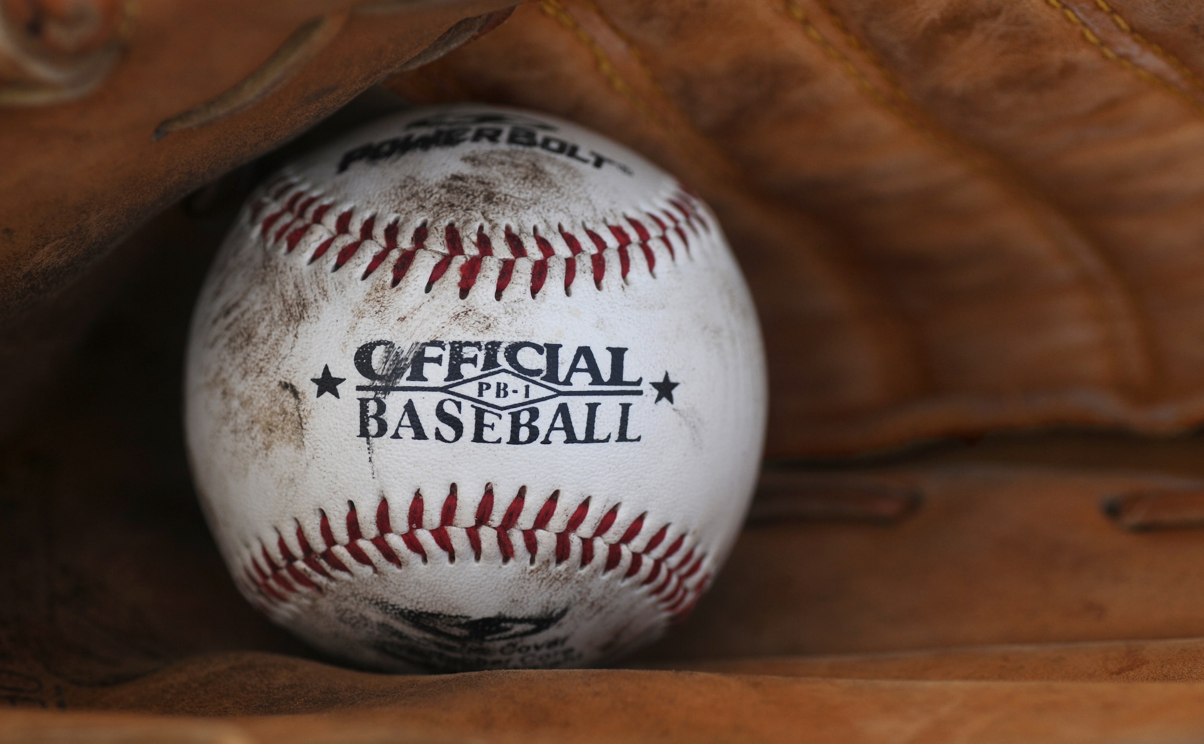 Baseball ball inside a glove